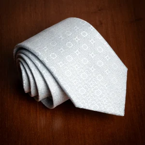 Cravatta Jacquard Celeste e Bianca con Forme Circolari e Floreali