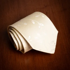 Cravatta Jacquard Champagne con Motivo Naturale