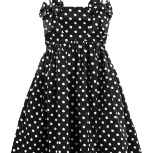 Abito in raso a pois di colore nero e bianco